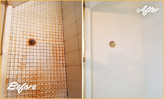 Before and After Picture of a Stained Shower Floor Cleaned and Restored