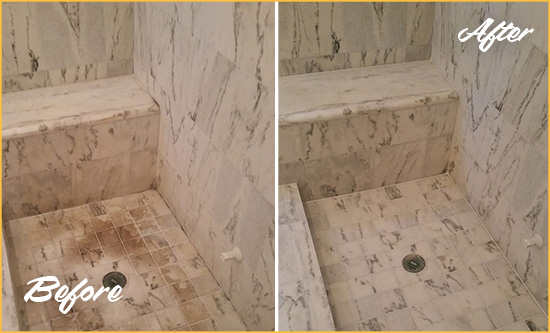 Before and After Picture of a Dirty Windermere Marble Shower Cleaned to Eliminate Dark Stains